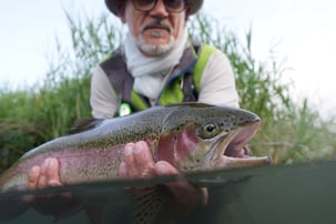 Angler holding fish 1