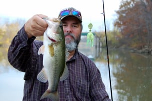 Man with Bass Fishing